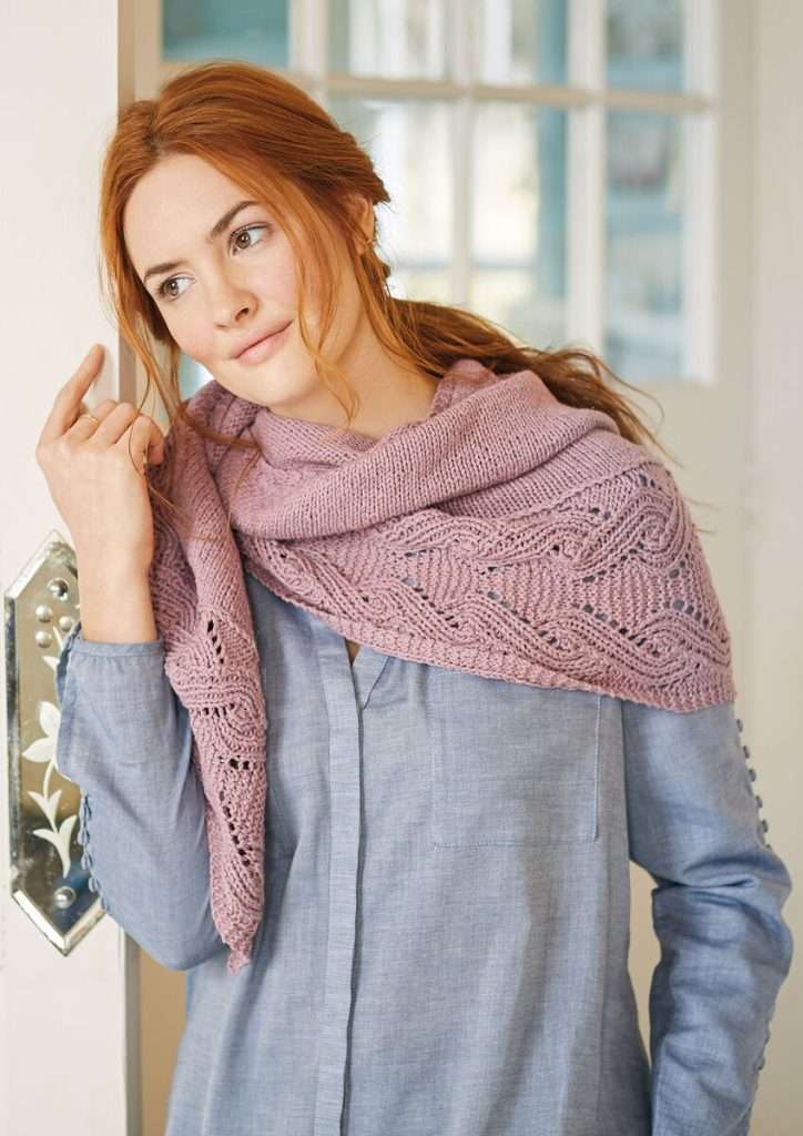 stockinette stitch knitted shawl featuring lace knit border