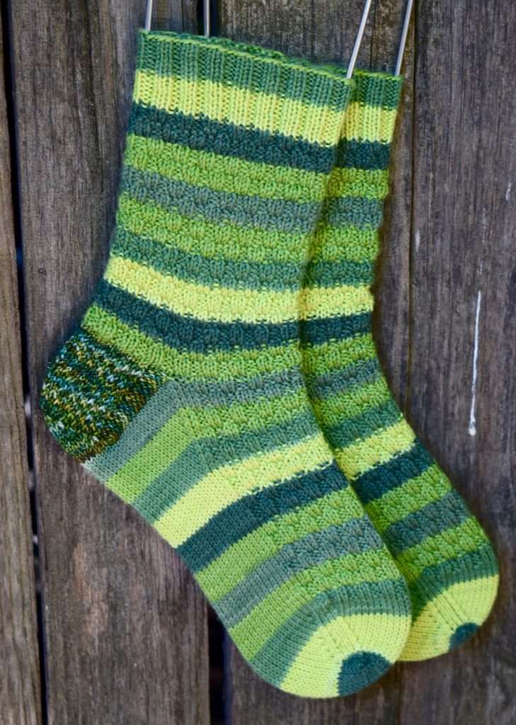 slip stitch knit sock pattern in self-striping fingering weight yarn