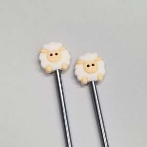 white sheep stitch stoppers for knitting needles