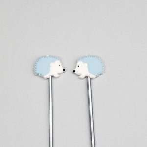 blue hedgehog point protectors for knitting needles