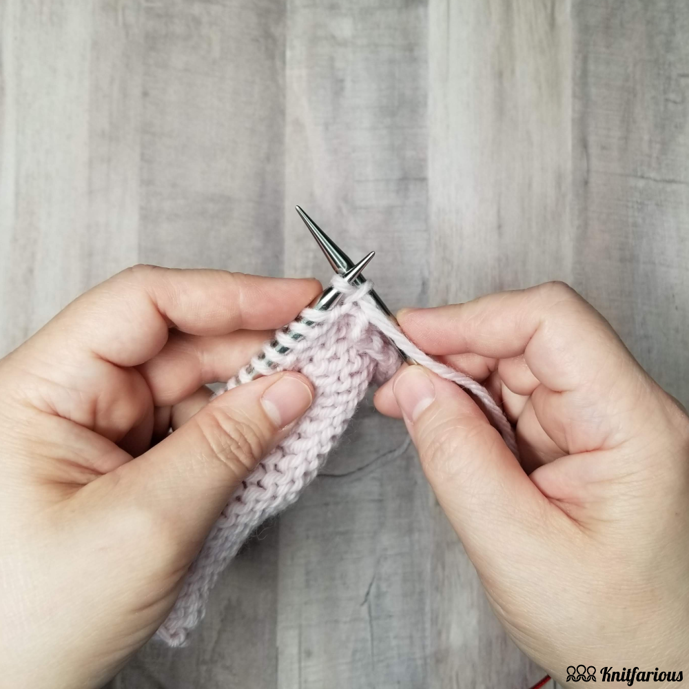 with the wrong side (purl side) of the knitting facing you, insert your right needle through the stitch from front to back to undo a ktbl