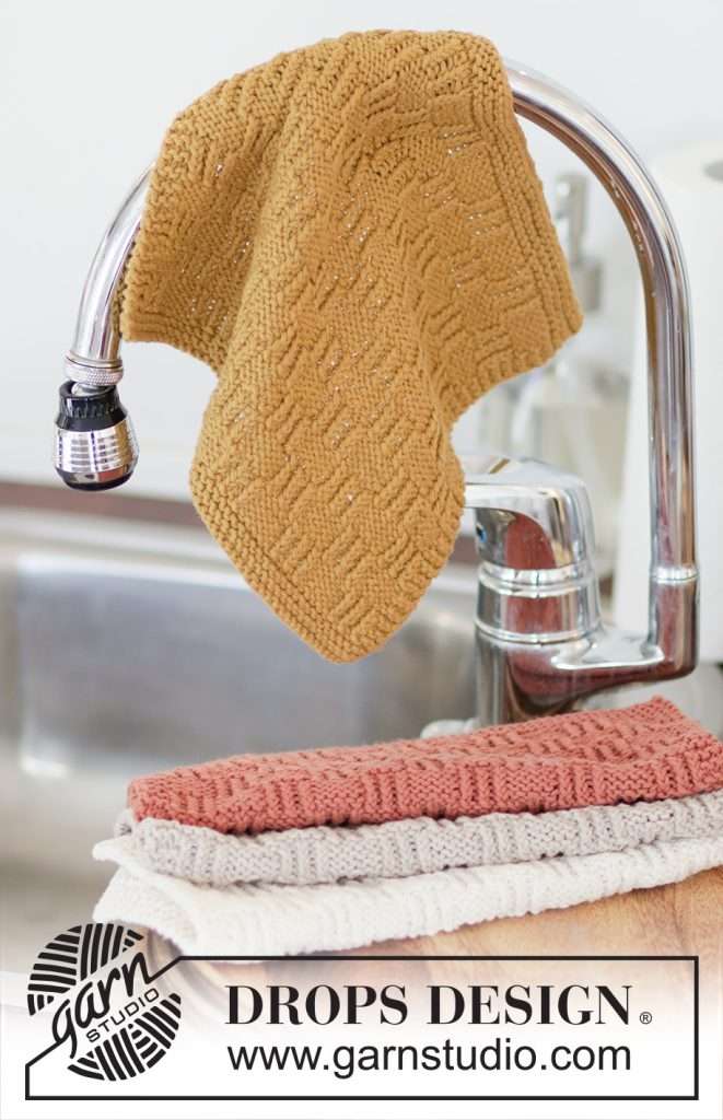 yellow knit washcloth features twisted stitches and creates touchable textures
